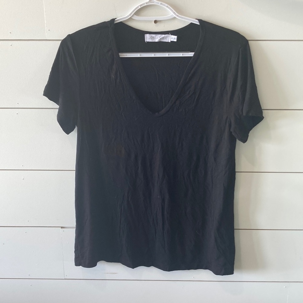 ALL IN FAVOR. Black shirt sleeve shirt.